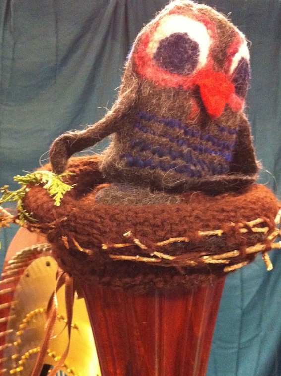 kleine uil in nest